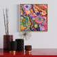 Colour Chaos framed 30 x 30 cm Aboriginal original painting by Aléjandro Lauren displayed above colourful home decor